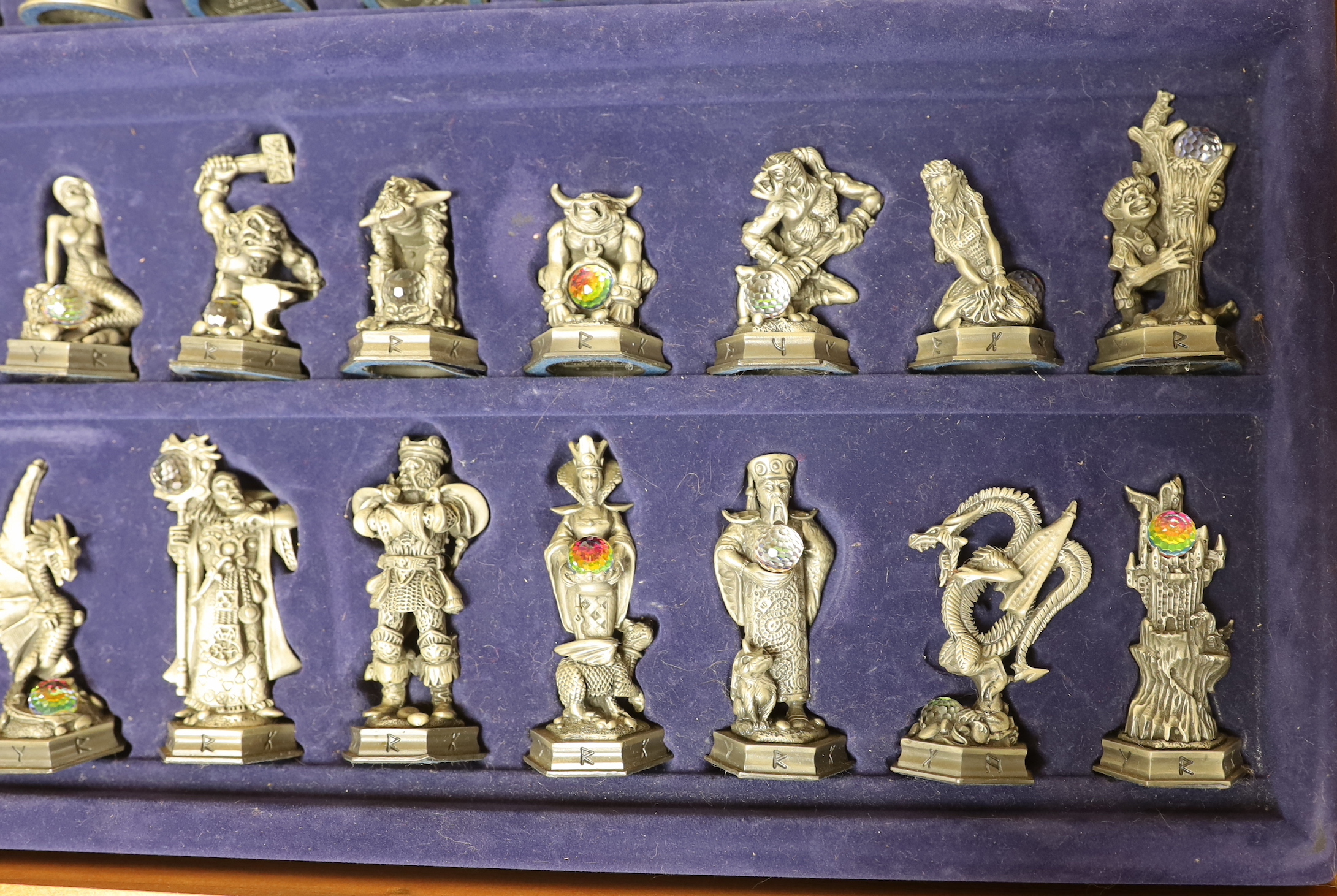 The Fantasy of the Crystal chess set and board with booklet and certificate of authenticity numbered 0598, the largest piece 8.5cm high